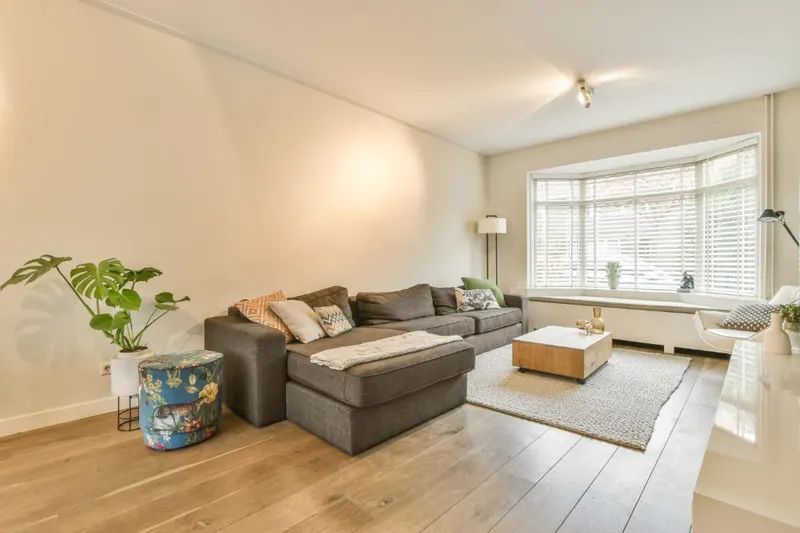 Original Modern Living Room with Wood Slats before Deqor AI